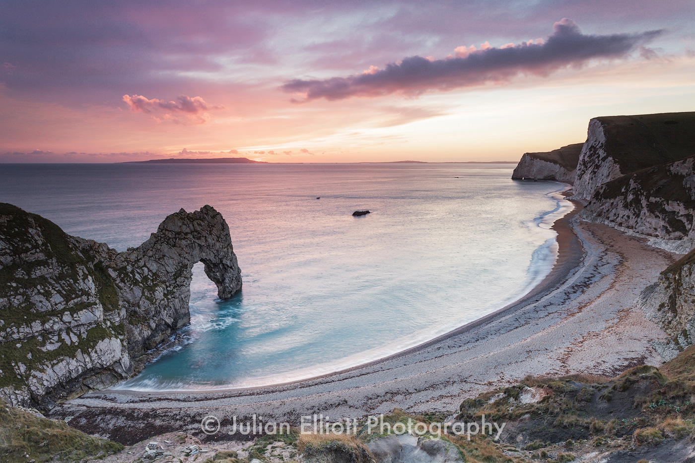 A colourful sunset over Durdle Door