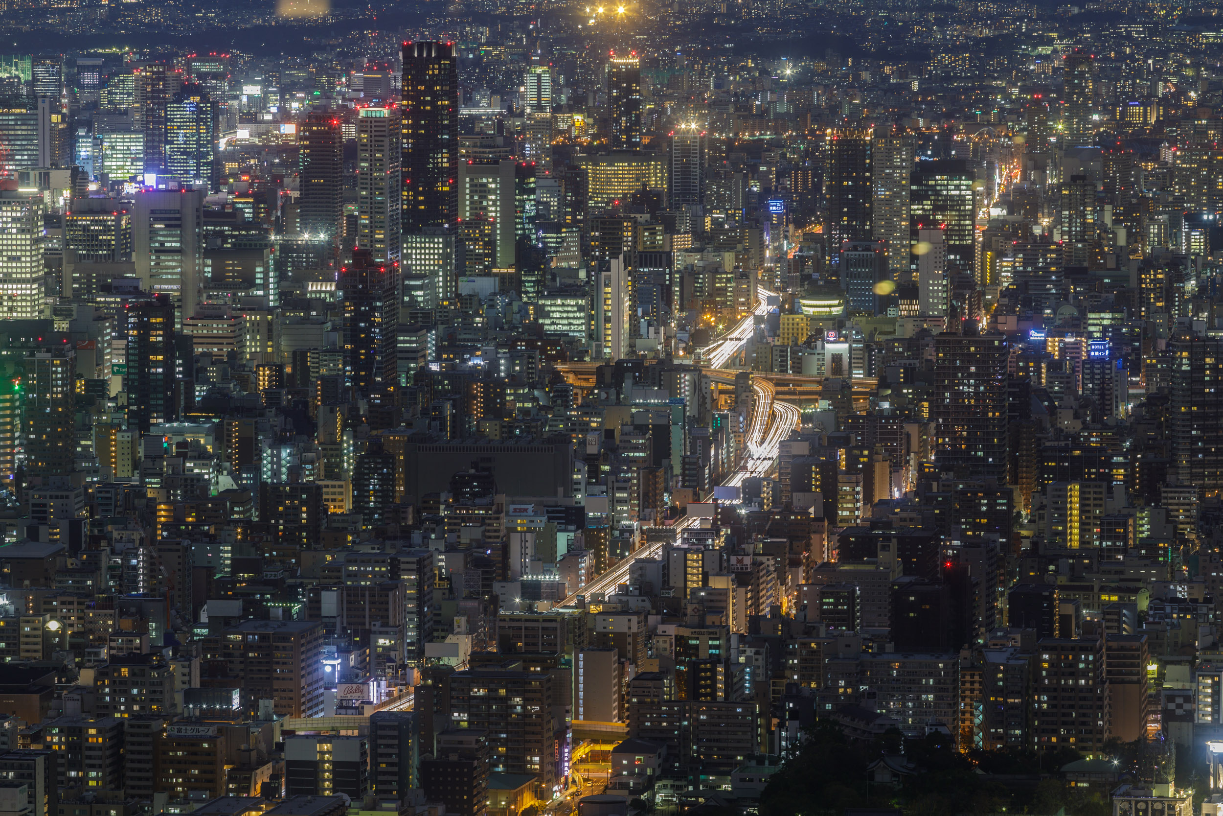 The cityscape of Osaka in Japan at night.