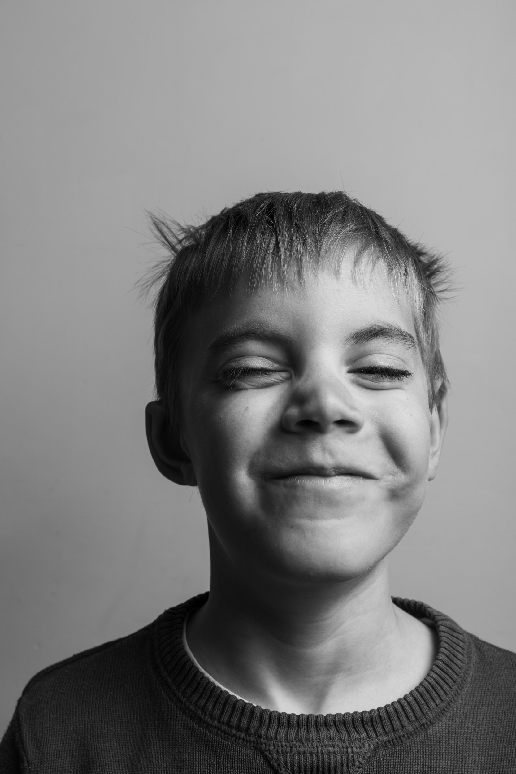 Black and white portrait of a young boy.