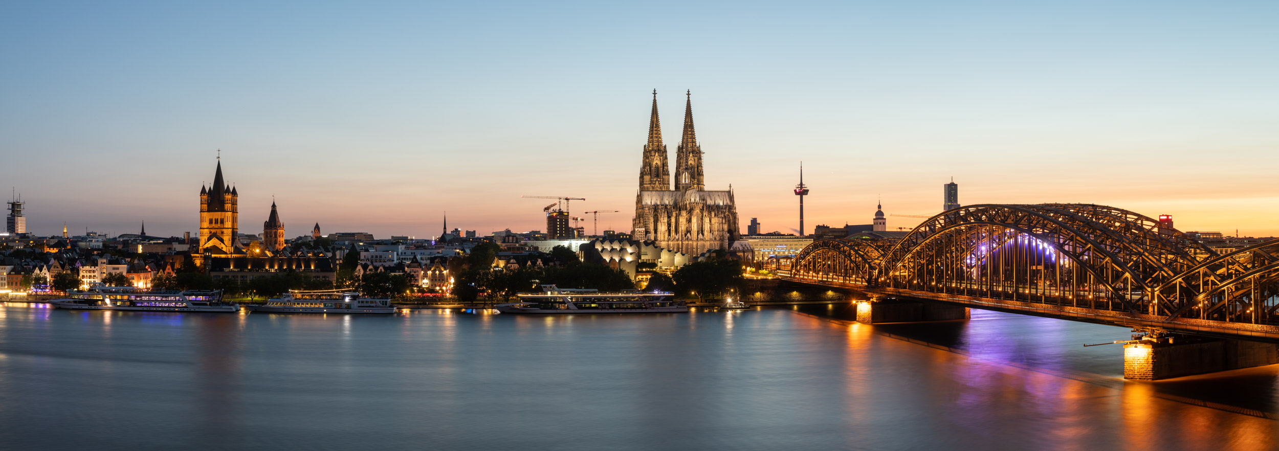 Panorama of the city of Cologne showing the river Rhine, the Dom or cathedral and the old town in Germany.