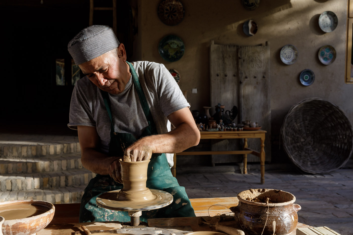 A master potter at work in Samarkand, Uzbekistan