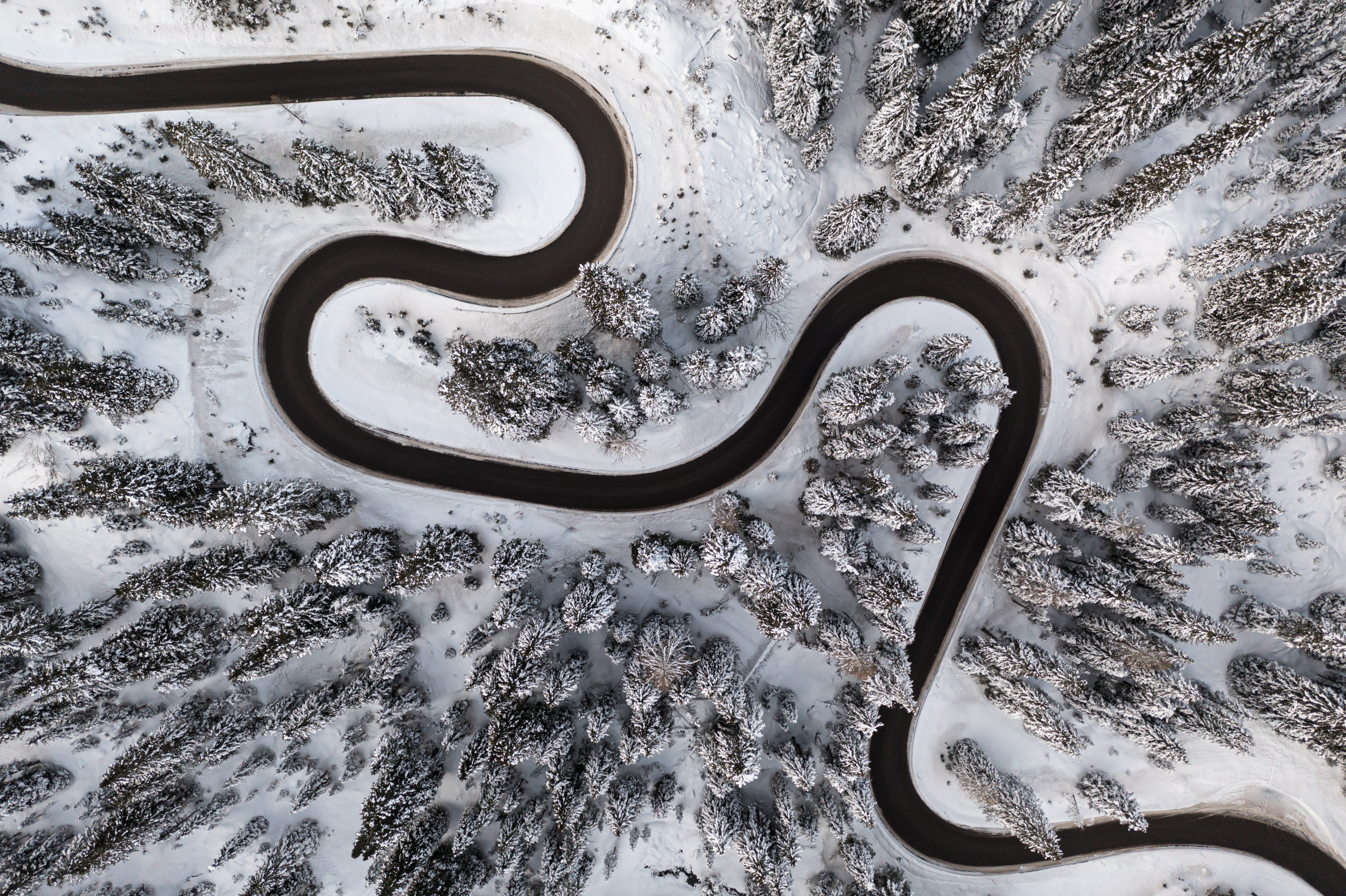 Aerial high angle view of the Passo Giau during winter in the Dolomites, Belluno province, Veneto, Italy.