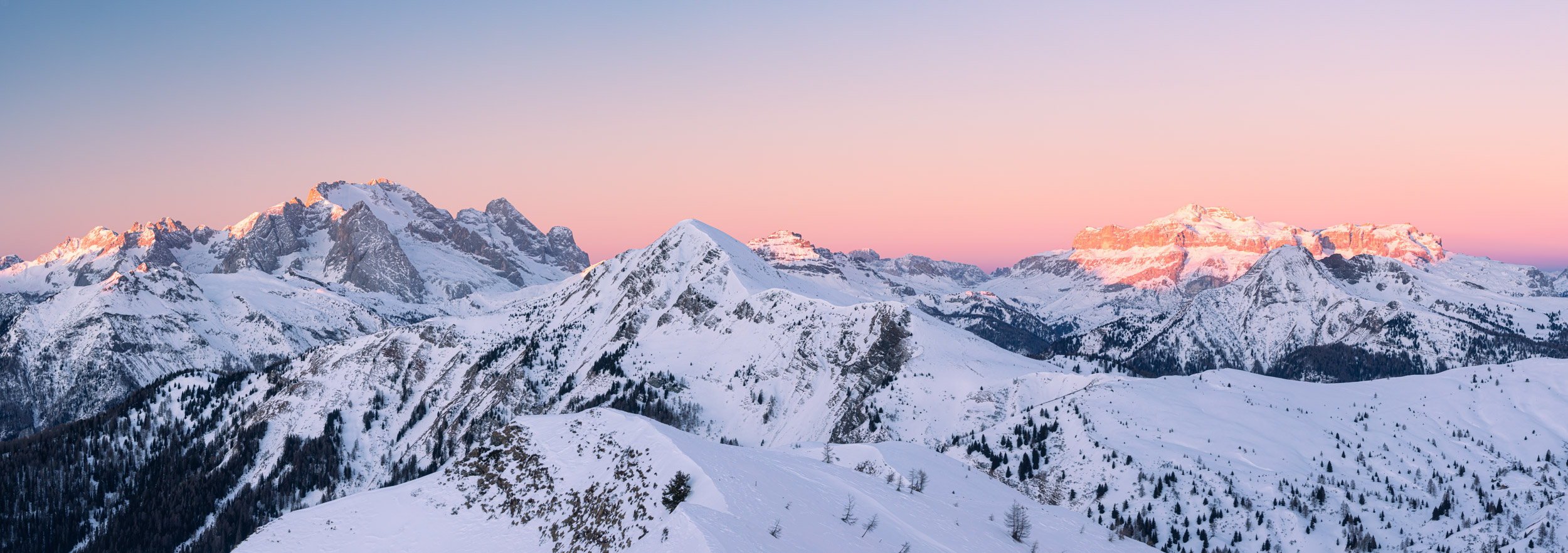 Panorama of a beautiful winter's sunrise in the Dolomites of northern Italy.