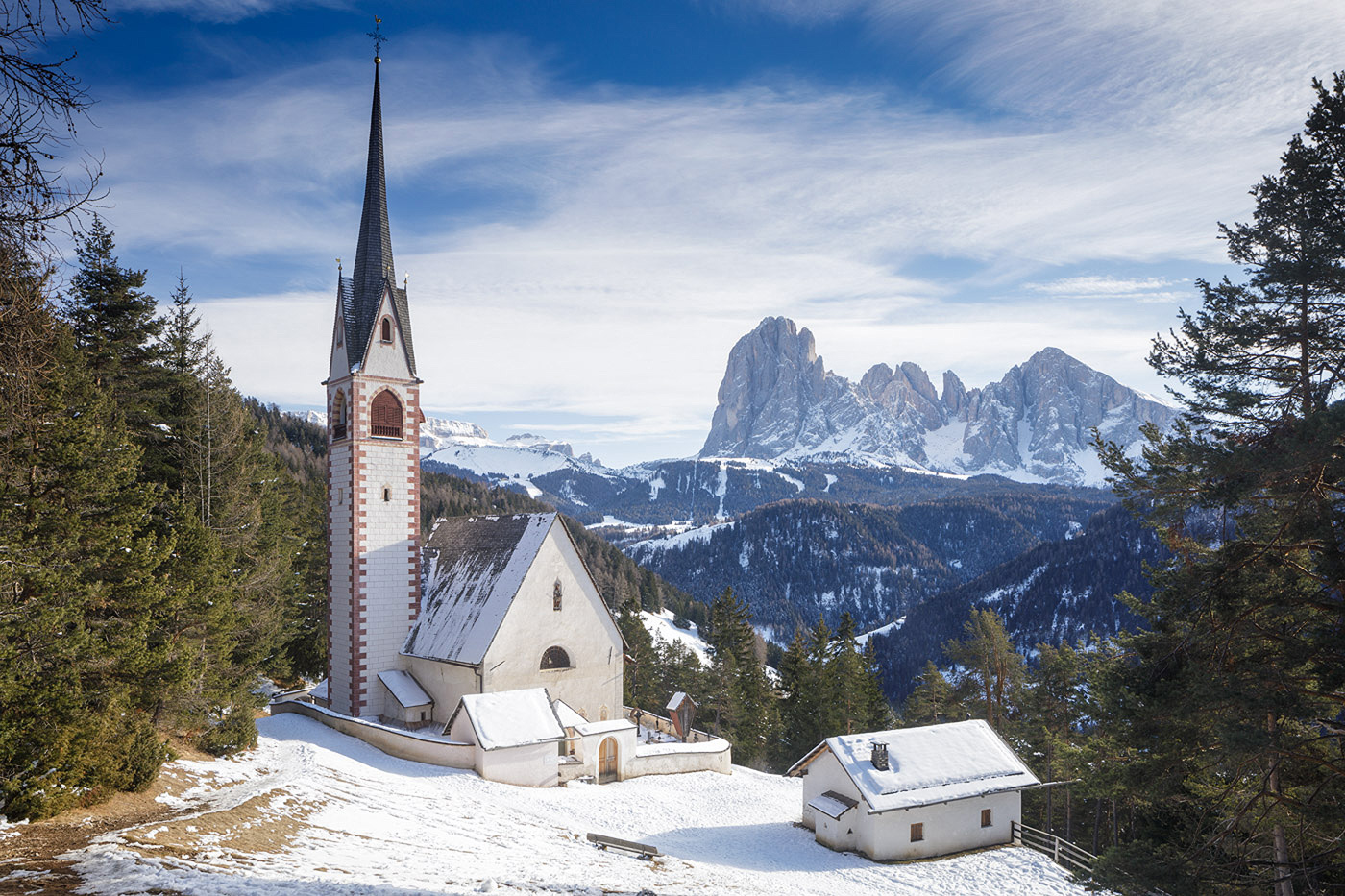Snow covered church in the Dolomites