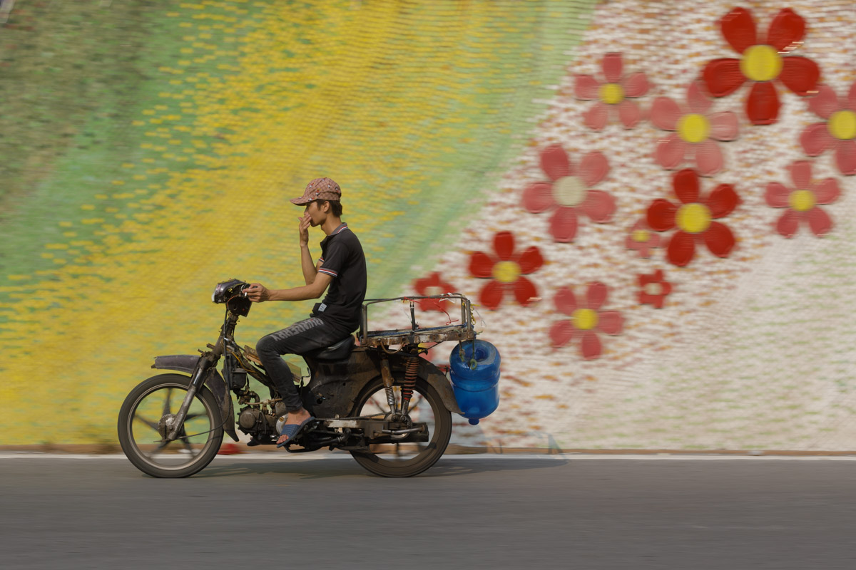 Mosaic on a wall in Hanoi, Vietnam photo tour.