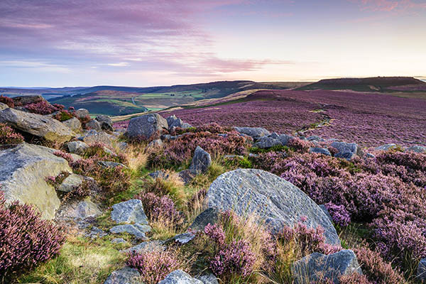 Hathersage Moor from Over Owler Tor. An upland area in the North West of England, the Peak District national park includes parts of Cheshire, Greater Manchester, Staffordshire and Yorkshire. It is known for its breathtaking views and geology.