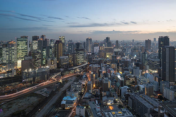 Modern high rise buidings at night in Osaka, Japan.