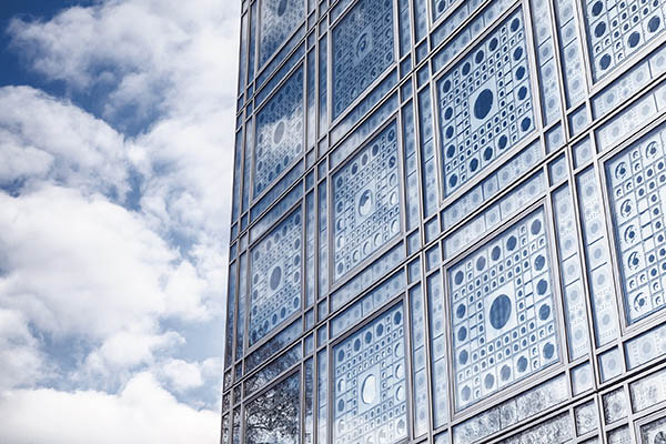 Abstract of the Institut du Monde Arabe in Paris. The building features 240 photo-sensitive motor-controlled apertures, or shutters, which act as a sophisticated brise soleil that automatically opens and closes to control the amount of light and heat entering the building from the sun. It was designed by Jean Nouvel.