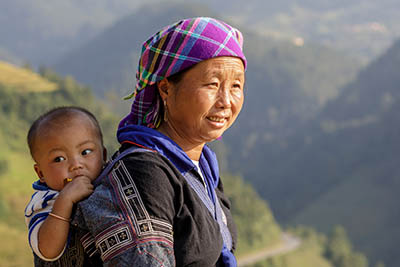 A woman from the Hmong tribe in Sa Pa, Vietnam. An ethnic group in eastern and south eastern Asia, the Hmong people are a sub-group of the Miao people who live principally in China, Vietnam and Laos.