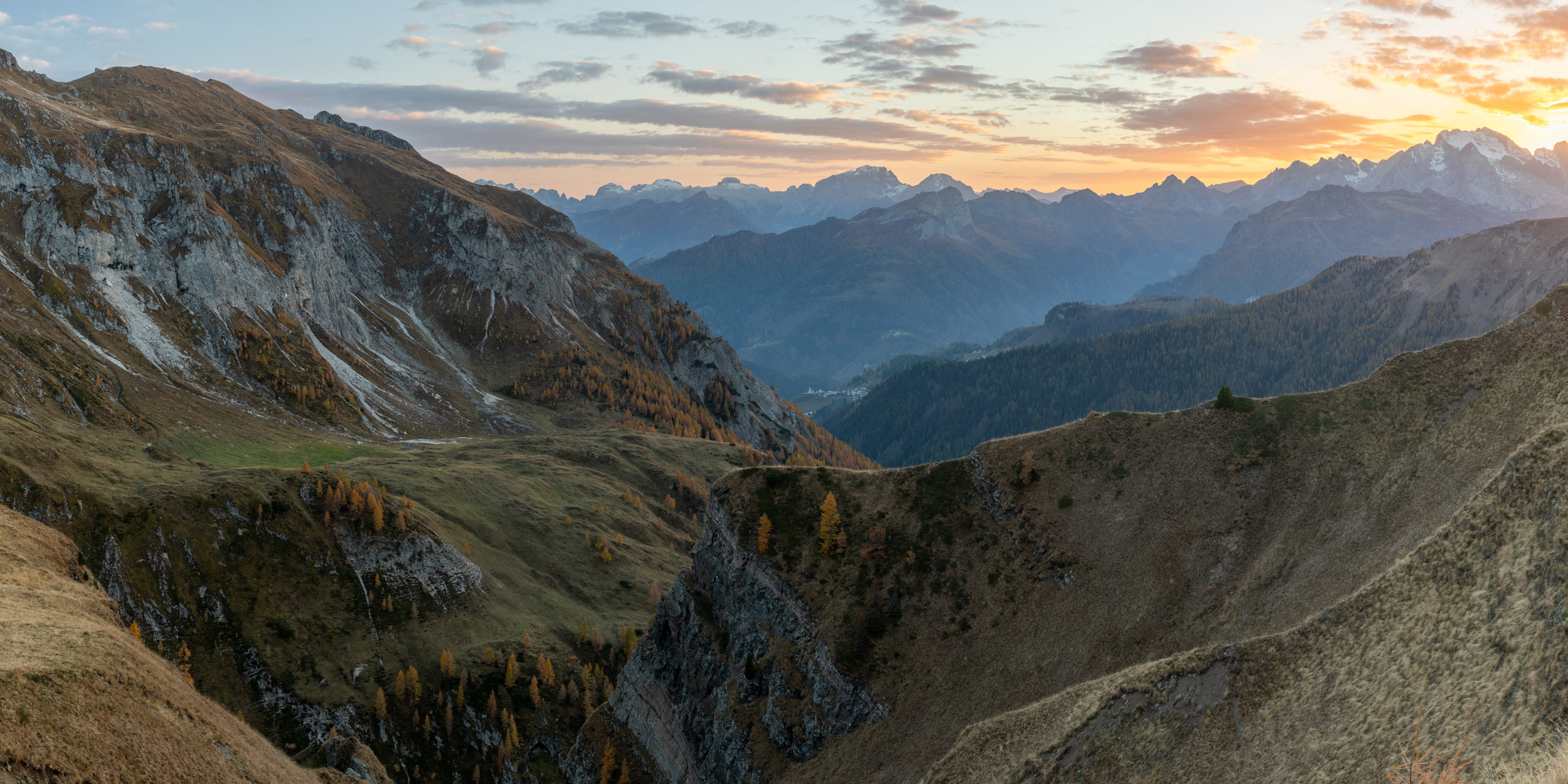 Panorama of the sunset over the Dolomites mountains from Passo Giau, Italy.
