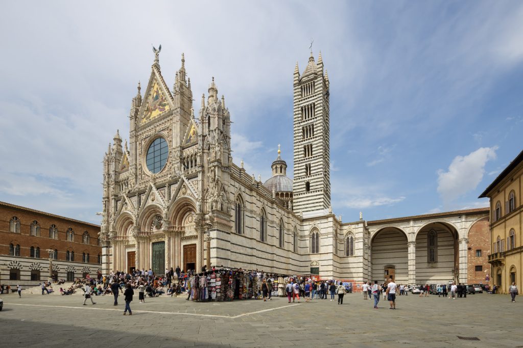 Il duomo di Siena or Siena cathedral, Italy. il duomo di Siena or Siena cathedral, Italy. The building dates from the mid-14th century, when the building was completed, and features architectural styles such as Gothic and Romanesque.
