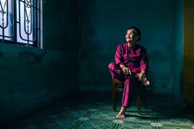 Quiet Contemplation. Mrs Song in Hoi An. The Top 101 International Portrait Photographers of the Year 2023.