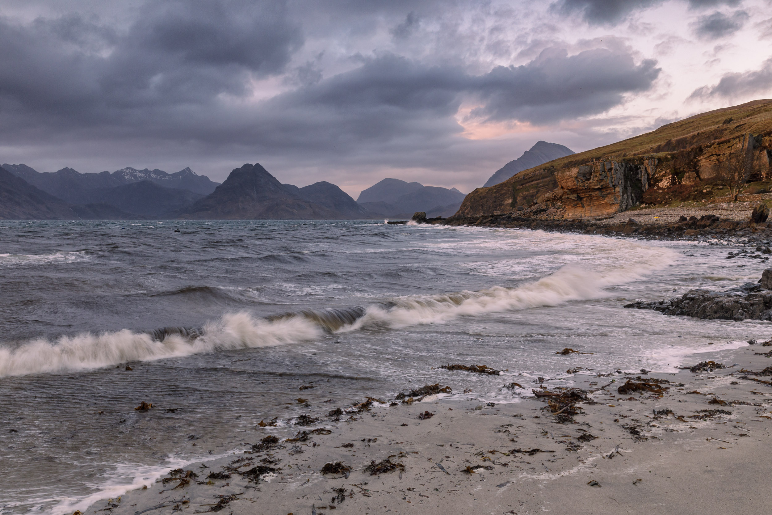 Waves lapping on the beach at Elgol on the Isle of Skye, Scotland, UK.