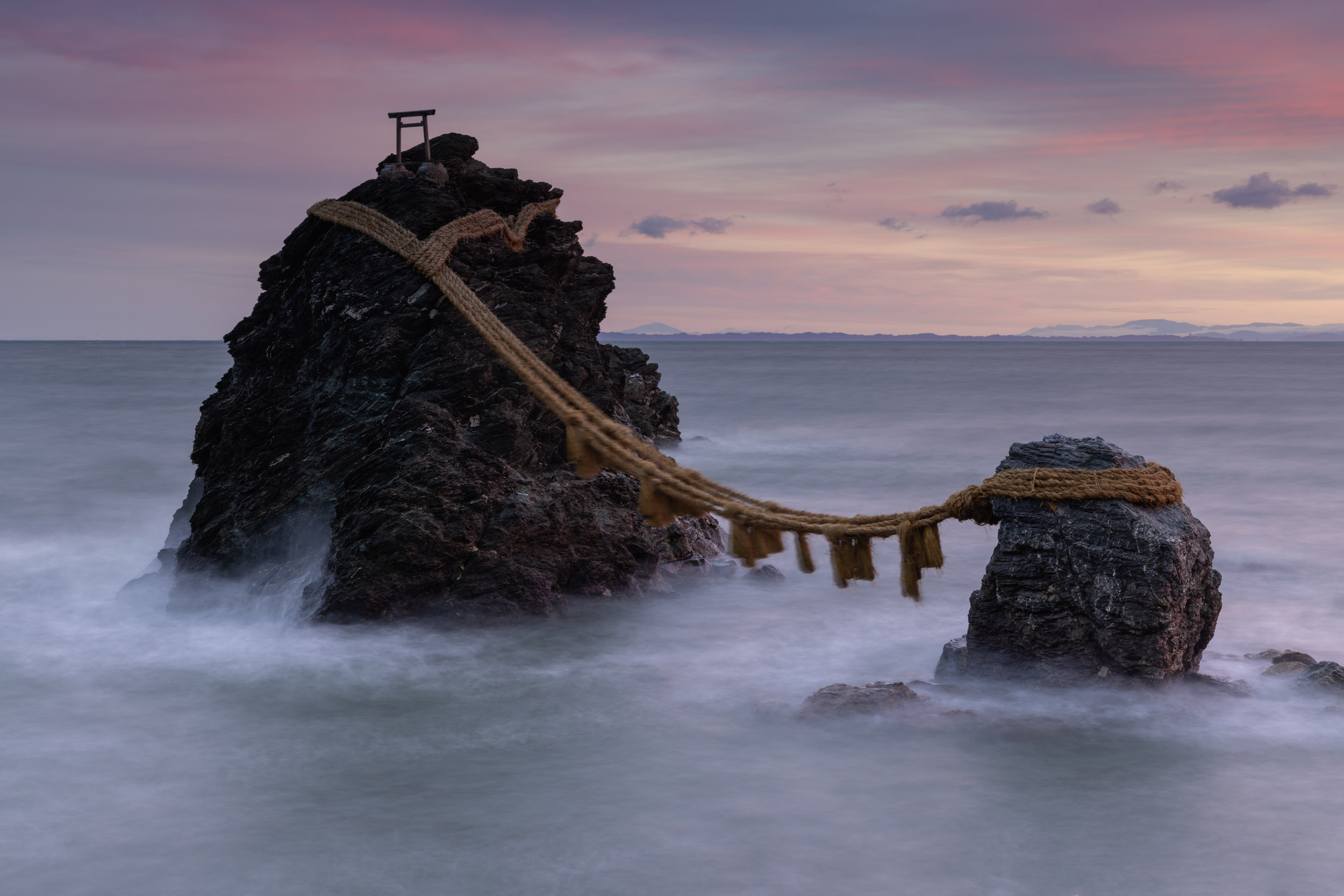 The Wedded Rocks or Meoto Iwa off the coastline of Mie in Japan.