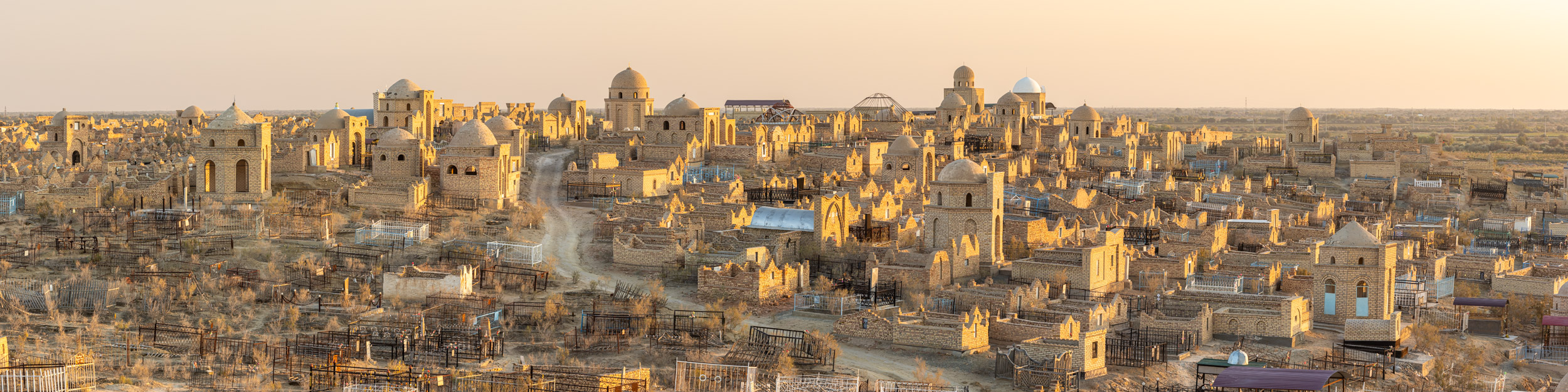 Panorama of the evening light illuminating the Mizdarkhan cemetary near to Nukus, Uzbekistan.