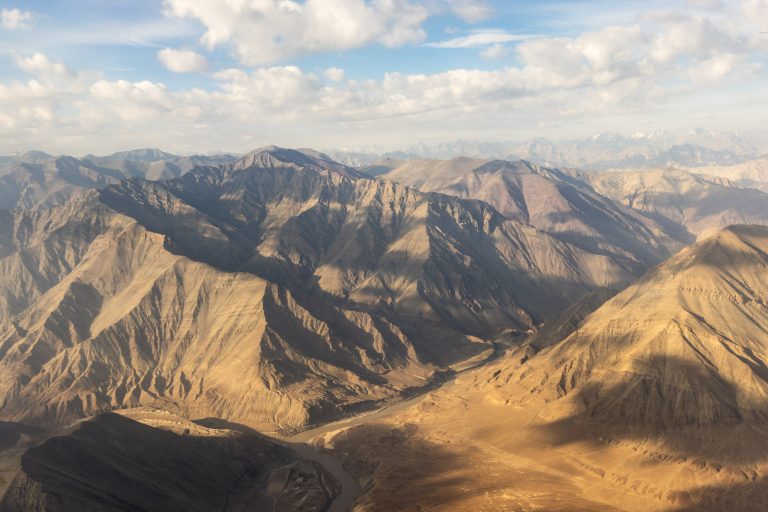 Aerial high-angle view of the mountains surround Leh in Ladakh, India.
