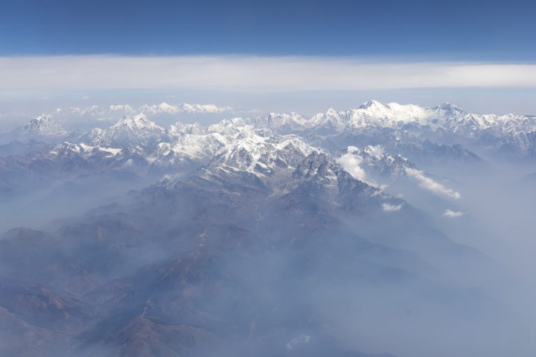 The snow covered Himalayas on a flight from Kathmandu.