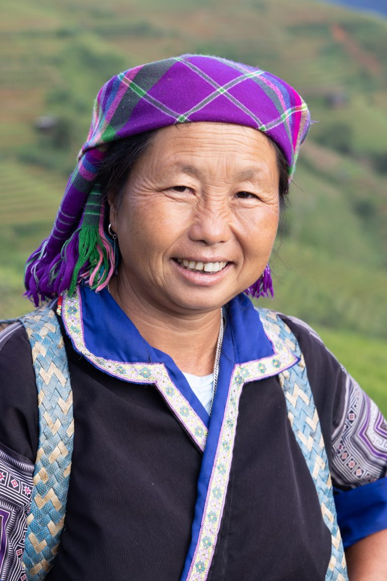 A Hmong woman poses for her portrait in Mu Cang Chai, Vietnam.
