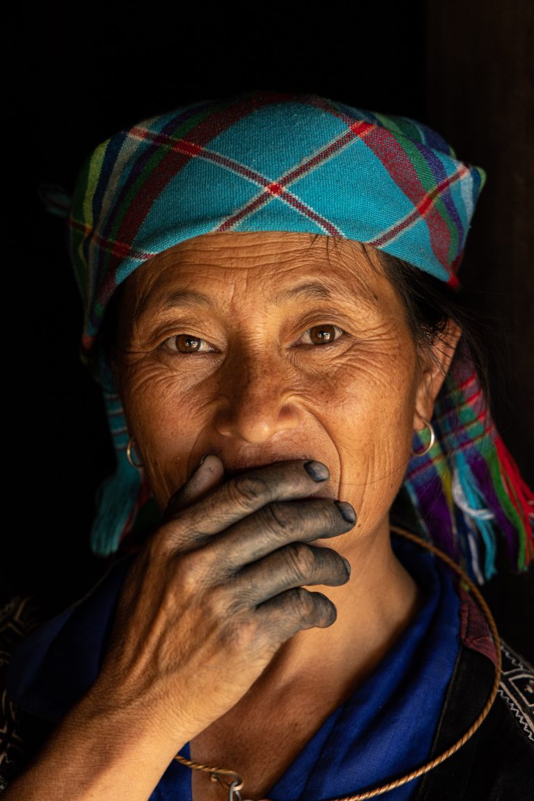 A Hmong woman poses for her portrait in Mu Cang Chai, Vietnam.
