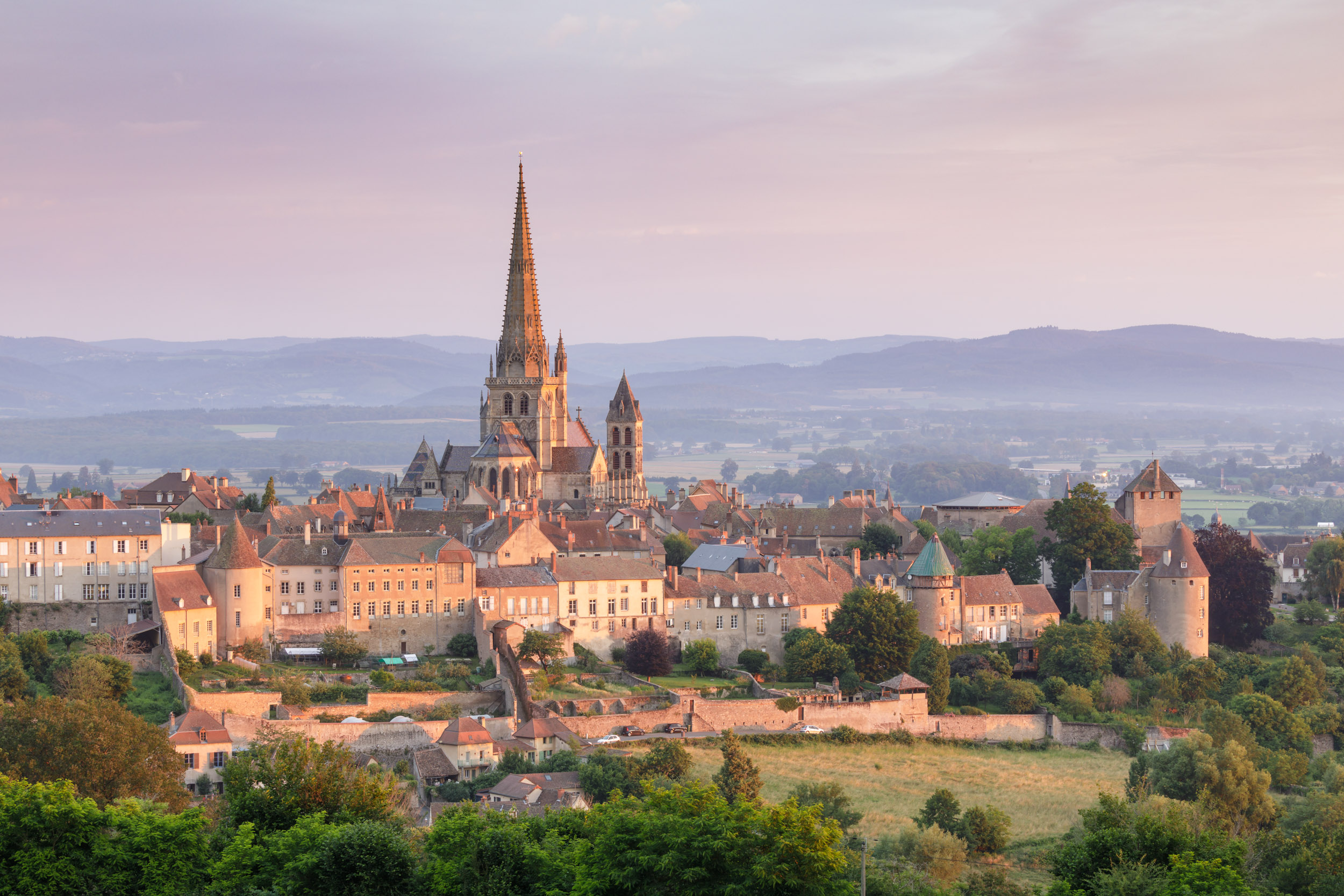 The Cathedrale Saint-Lazare d'Autun rising above the city of Autun in Saone-et-Loire, France. September 2021 newsletter cover.
