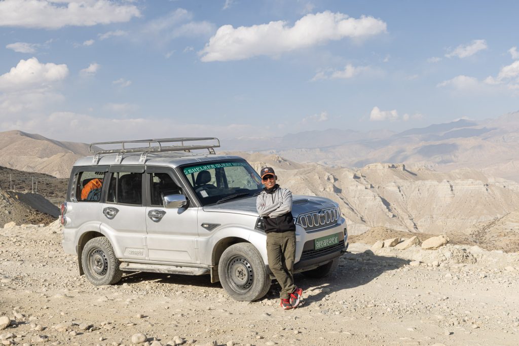 A Scorpio Jeep and driver in Nepal. Taken during the Nepal Upper Mustang Photo Tour with Julian Elliott.