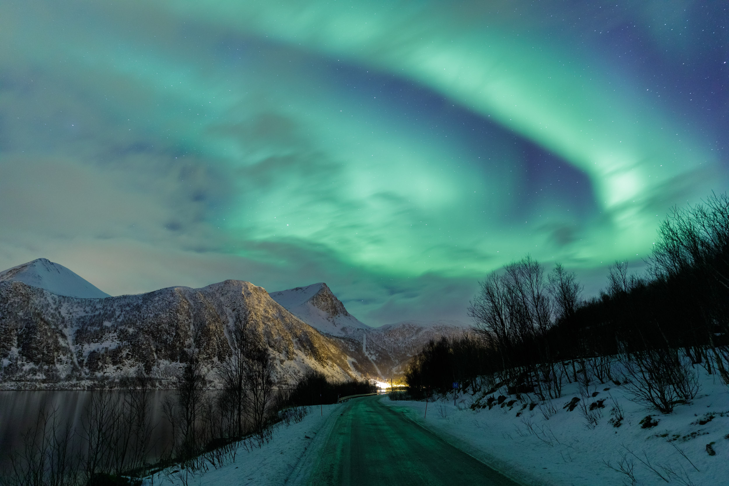 The northern lights or aurora borealis lighting up the sky on Senja. Captured during the Norway photography tour.