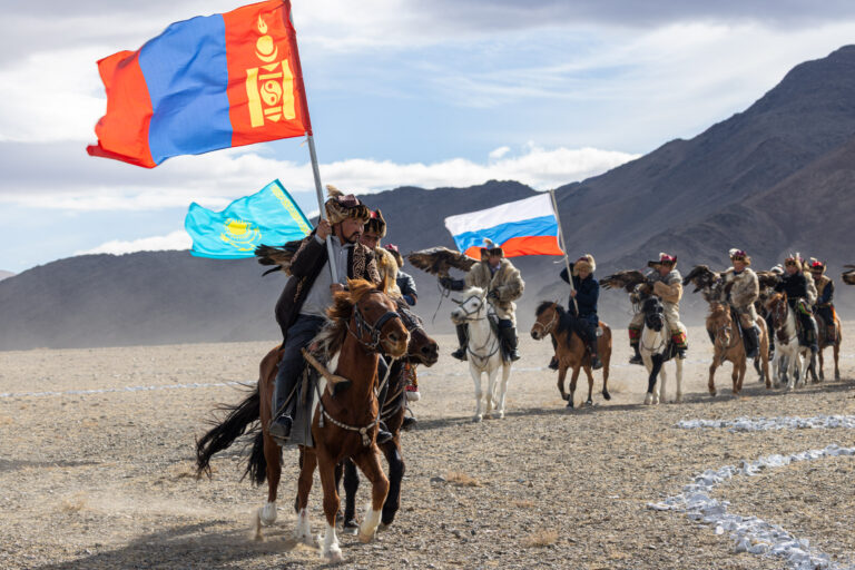 Kazakh Mongolian eagle hunters at the Golden Eagle festival near to Olgii. Taken on the Mongolia Photo Tour & Golden Eagle Festival.