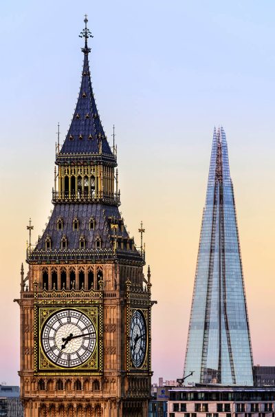 The Elizabeth Tower and The Shard, London. Part of the Houses of Parliament, the Elizabeth Tower houses Big Ben which is one of the World's most famous bell.