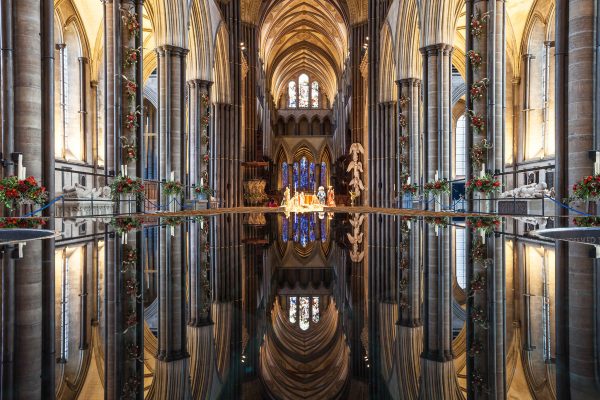 The font of Salisbury cathedral, UK. The cathedral is one of the best examples of Early English architecture. Due to the short period of time that it was in, the cathedral has a consistent style that can be described as Early English Gothic. It was built in the 13th century and has the tallest spire in the United Kingdom.