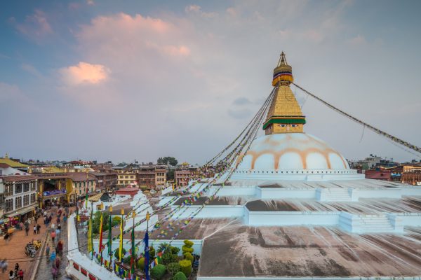 Sunset over the Great Stupa on Boudhanath Square in central Kathmandu.