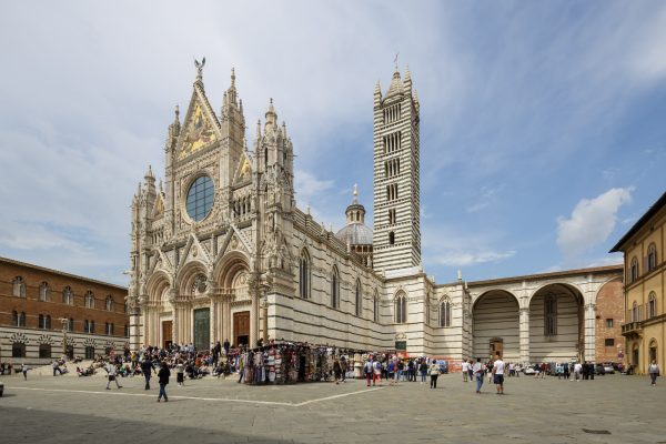Il Duomo di Siena or Siena cathedral and old city, Italy.