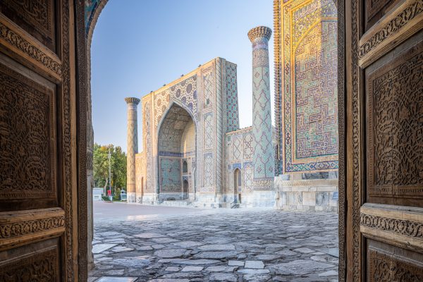 The beautifully ornate Ulug Beg Madrasa in Registan Square, Samarkand.