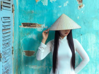 A beautiful Vietnamese woman dressed in the Ao Dai (traditional dress). One to one photography workshops in Hoi An.