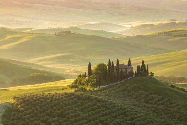 Il Belvedere farmhouse at sunrise in the Val d'Orcia. Photos of Tuscany gallery. Print by Julian Elliott Photography.